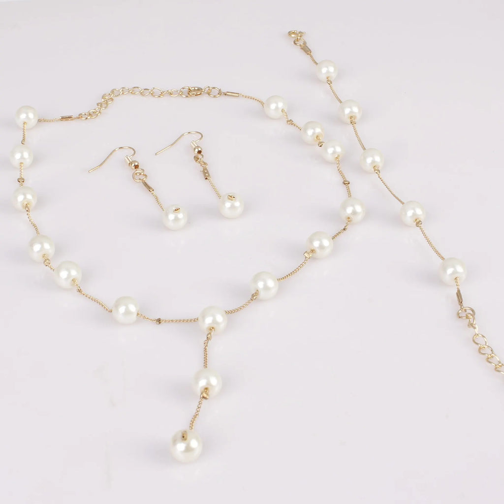4-Piece Gold Jewelry Set – Elegant Imitation Pearl Necklace, Earrings & Bracelet with Tassel Details