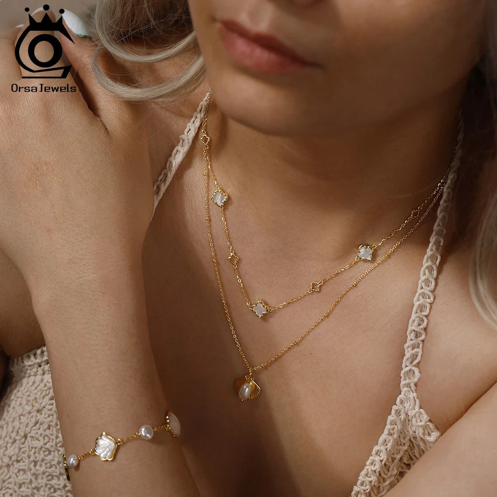 ORSA JEWELS Hollow Clover Necklace – 925 Silver Four-Flower Luxury Chain for Parties & Gifts