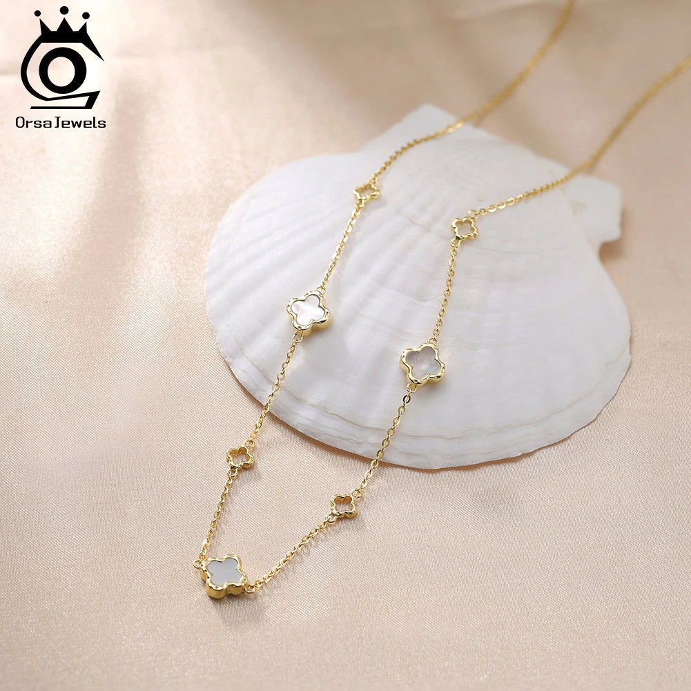 ORSA JEWELS Hollow Clover Necklace – 925 Silver Four-Flower Luxury Chain for Parties & Gifts