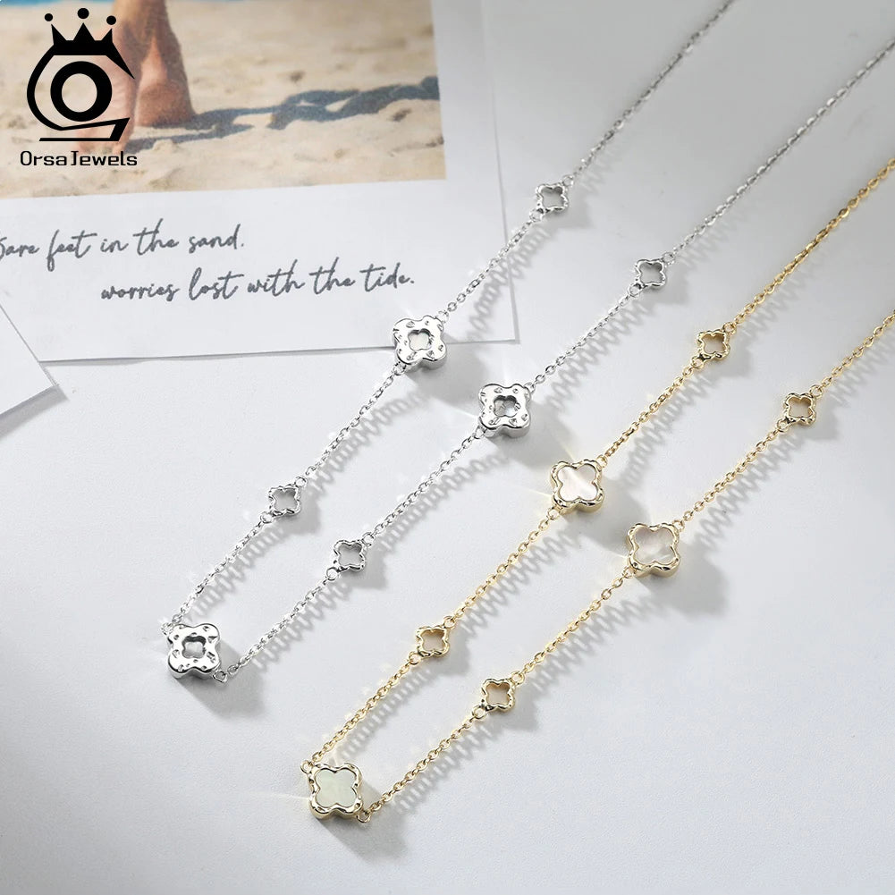 ORSA JEWELS Hollow Clover Necklace – 925 Silver Four-Flower Luxury Chain for Parties & Gifts