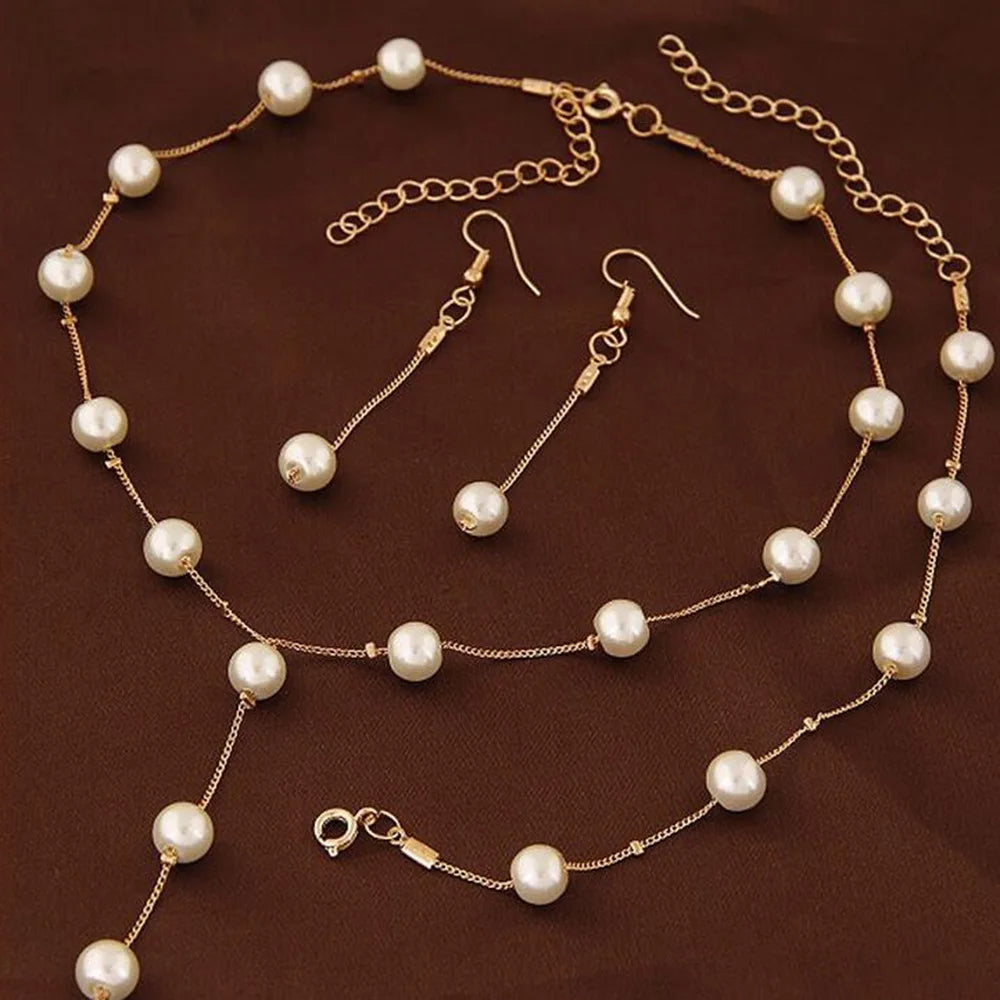 4-Piece Gold Jewelry Set – Elegant Imitation Pearl Necklace, Earrings & Bracelet with Tassel Details