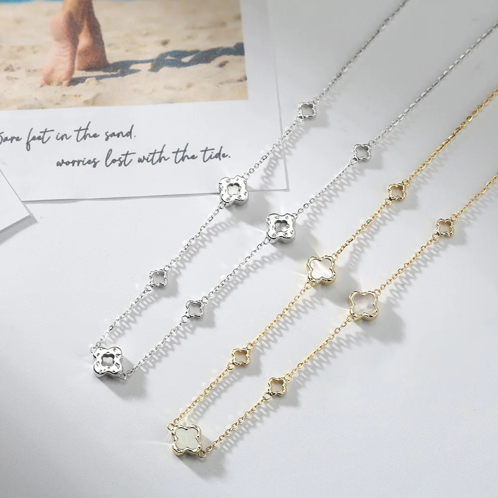 ORSA JEWELS Hollow Clover Necklace – 925 Silver Four-Flower Luxury Chain for Parties & Gifts