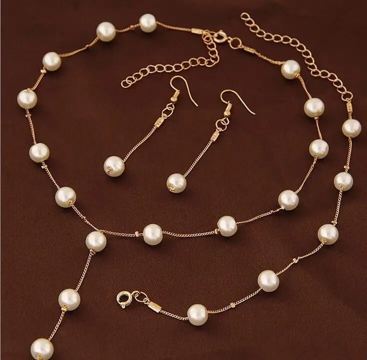 4-Piece Gold Jewelry Set – Elegant Imitation Pearl Necklace, Earrings & Bracelet with Tassel Details