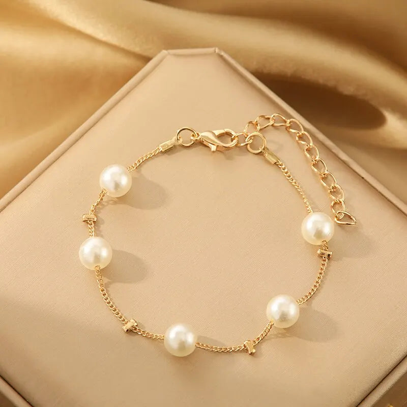 4-Piece Gold Jewelry Set – Elegant Imitation Pearl Necklace, Earrings & Bracelet with Tassel Details