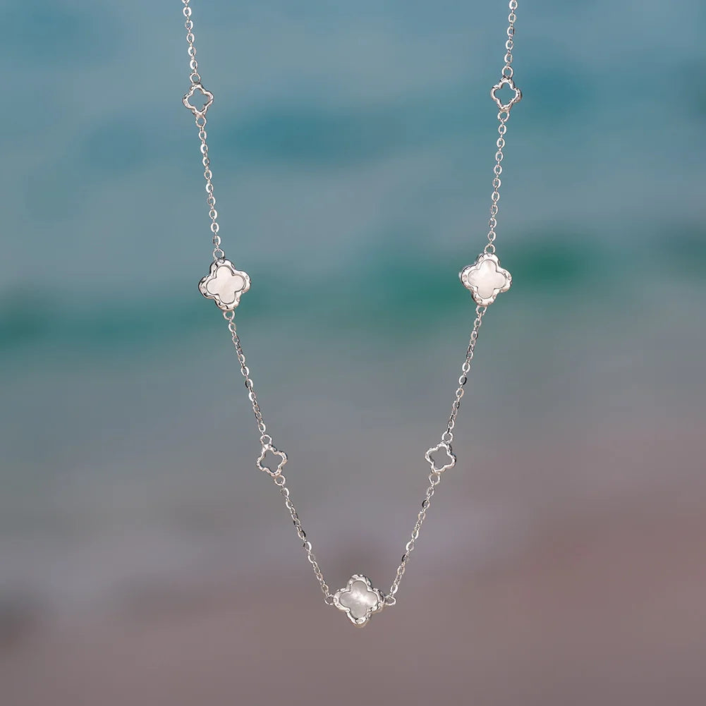 ORSA JEWELS Hollow Clover Necklace – 925 Silver Four-Flower Luxury Chain for Parties & Gifts