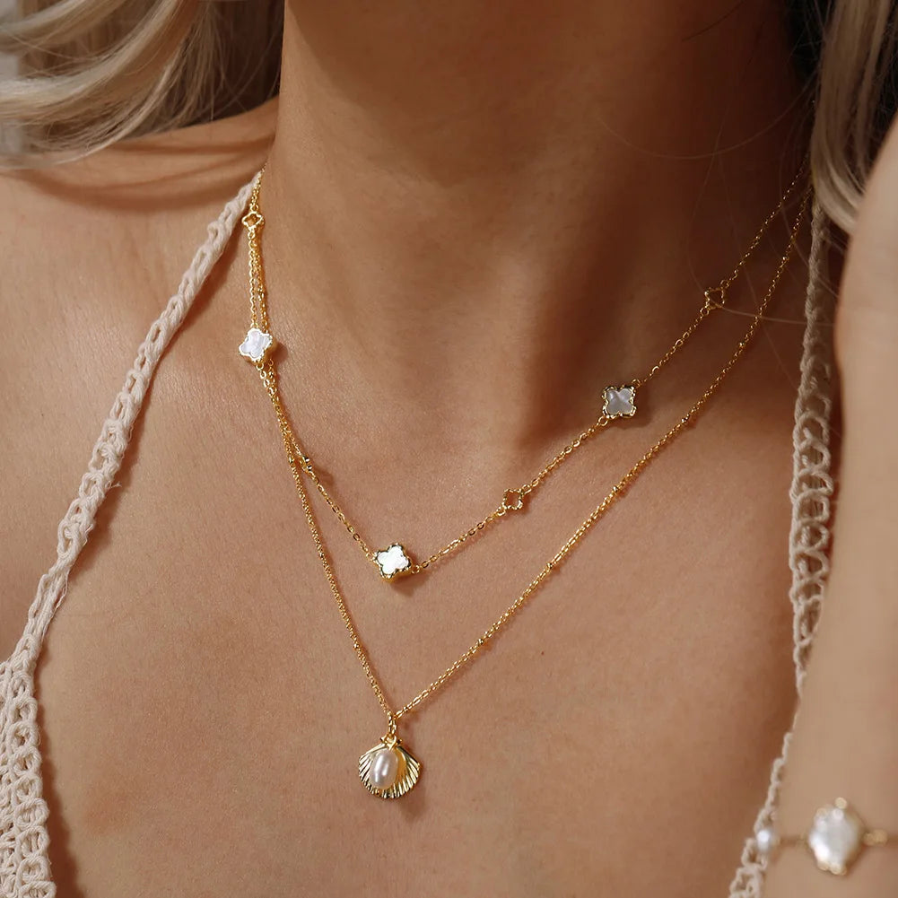 ORSA JEWELS Hollow Clover Necklace – 925 Silver Four-Flower Luxury Chain for Parties & Gifts