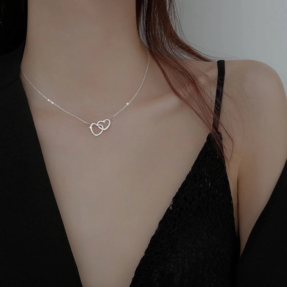 Hollow Double Heart Necklace – Creative Silver Connected Heart Pendant for Women